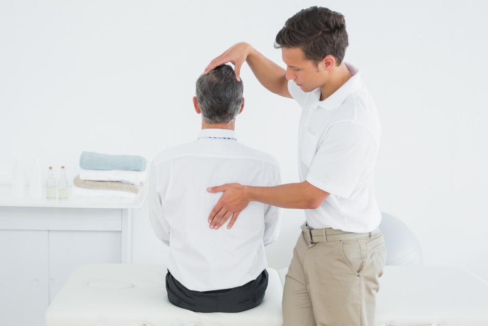man giving a chiropractic adjustment